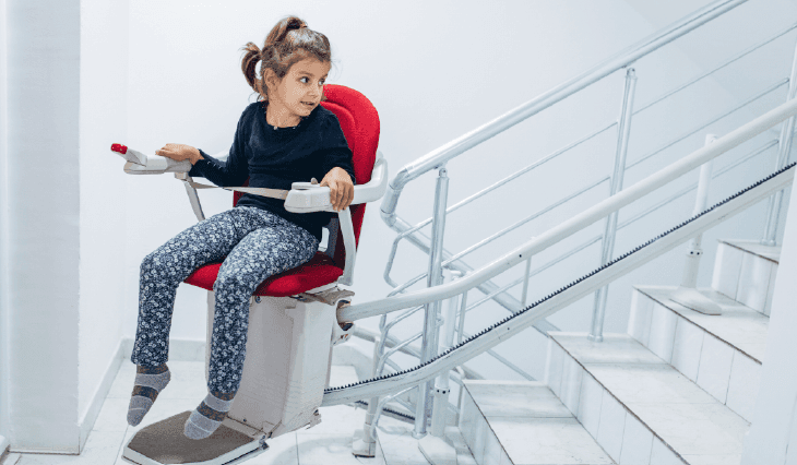 Child in a sitting stairlift